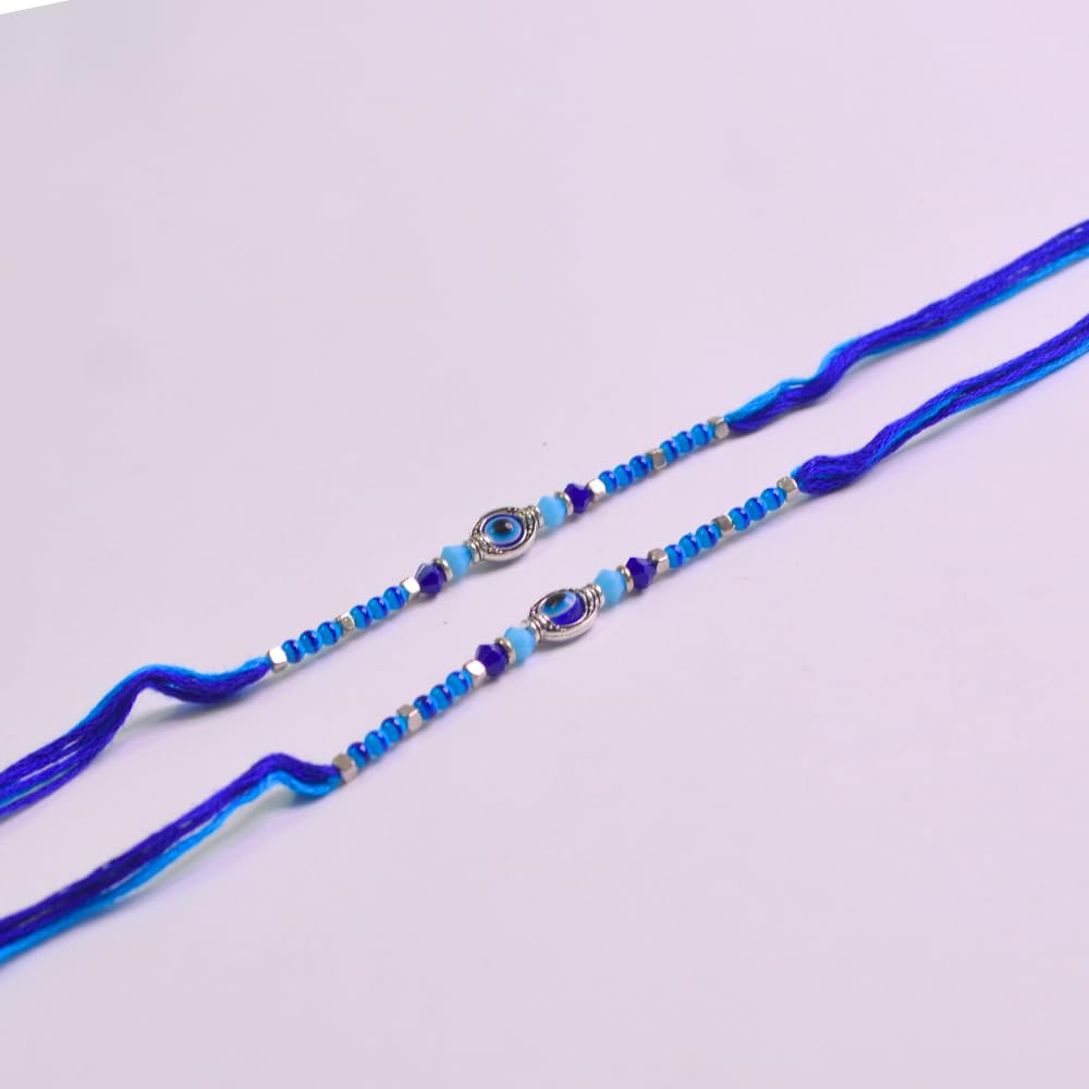 santarms Rakhi Combo Of 2 Rakshabandhan Celebrations Gift Evil Eyes With Mauli And Chawal For Brother Bhabhi