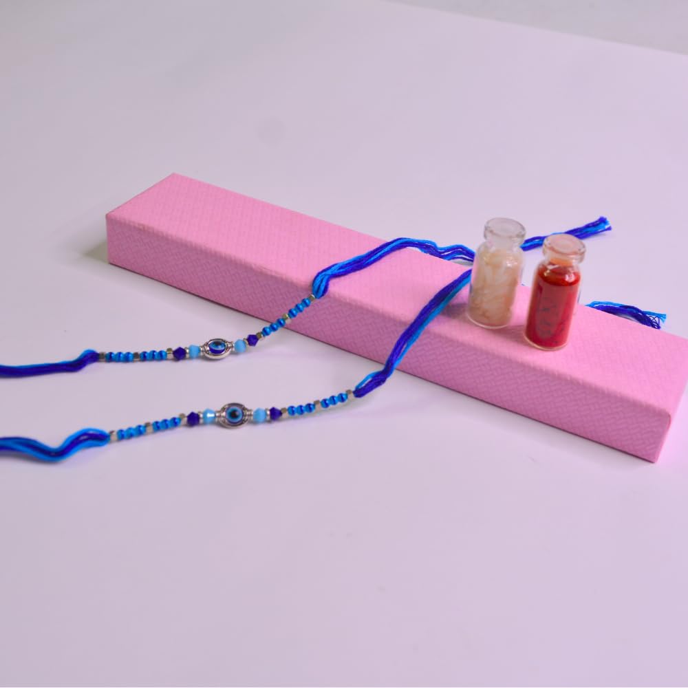 santarms Rakhi Combo Of 2 Rakshabandhan Celebrations Gift Evil Eyes With Mauli And Chawal For Brother Bhabhi