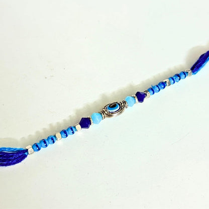 santarms Evil Eye Rakhi with Roli Chawal Vials – Blue Nazar Battu Rakhi for Boys, Men, Brother – Stylish Beaded Thread Bracelet for Raksha Bandhan - Set of 2