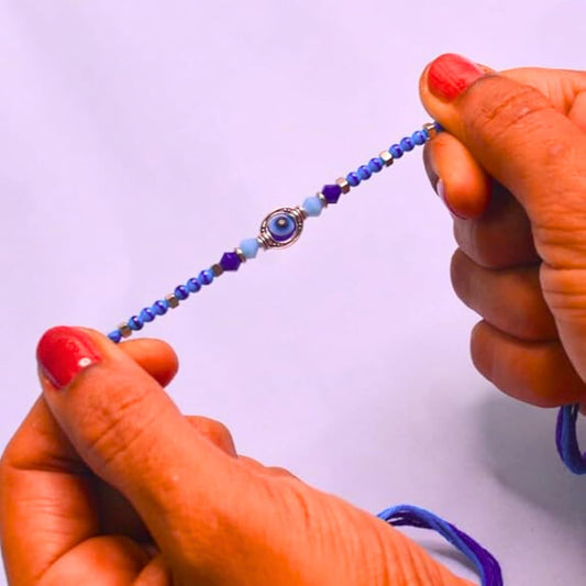 santarms Evil Eye Rakhi with Roli Chawal Vials – Blue Nazar Battu Rakhi for Boys, Men, Brother – Stylish Beaded Thread Bracelet for Raksha Bandhan - Set of 2