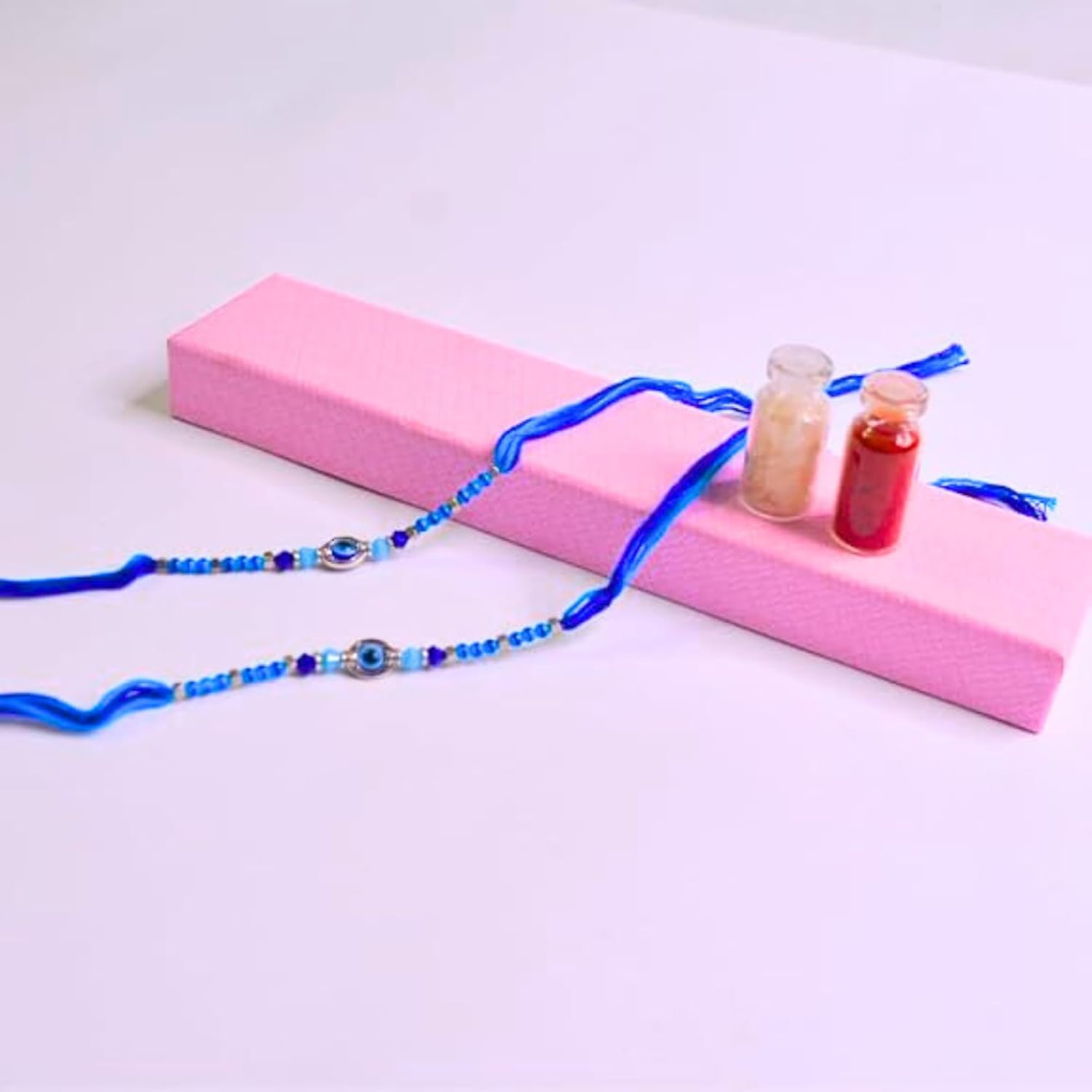 santarms Evil Eye Rakhi with Roli Chawal Vials – Blue Nazar Battu Rakhi for Boys, Men, Brother – Stylish Beaded Thread Bracelet for Raksha Bandhan - Set of 2
