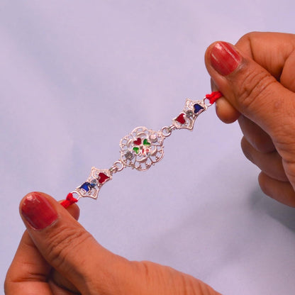 santarms Set of 2 Silver Flower Designer Rakhis with Red Threads, and Free Roli Chawal Pack - Rakhis for Brothers
