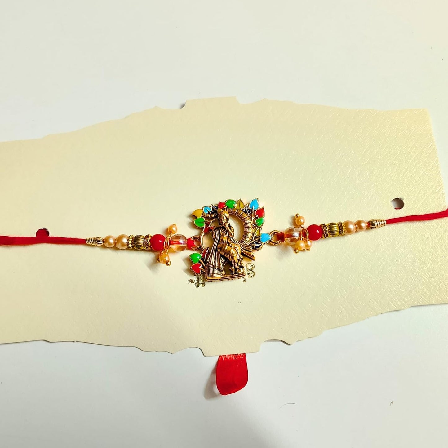 santarms Krishna Rakhi for Brother | Traditional Raksha Bandhan Rakhi with Colorful Beads, Roli and Chawal for Men & Boys