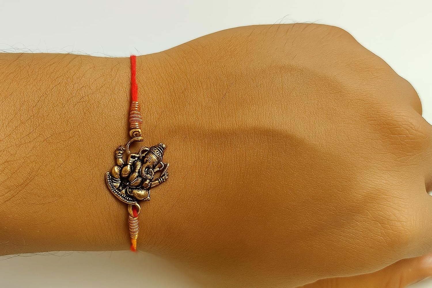 santarms Ganesh Ji Rakhi for Brother | Traditional Lord Ganesha Rakhi for Rakshabandhan with Decorative Box & Roli Chawal Combo