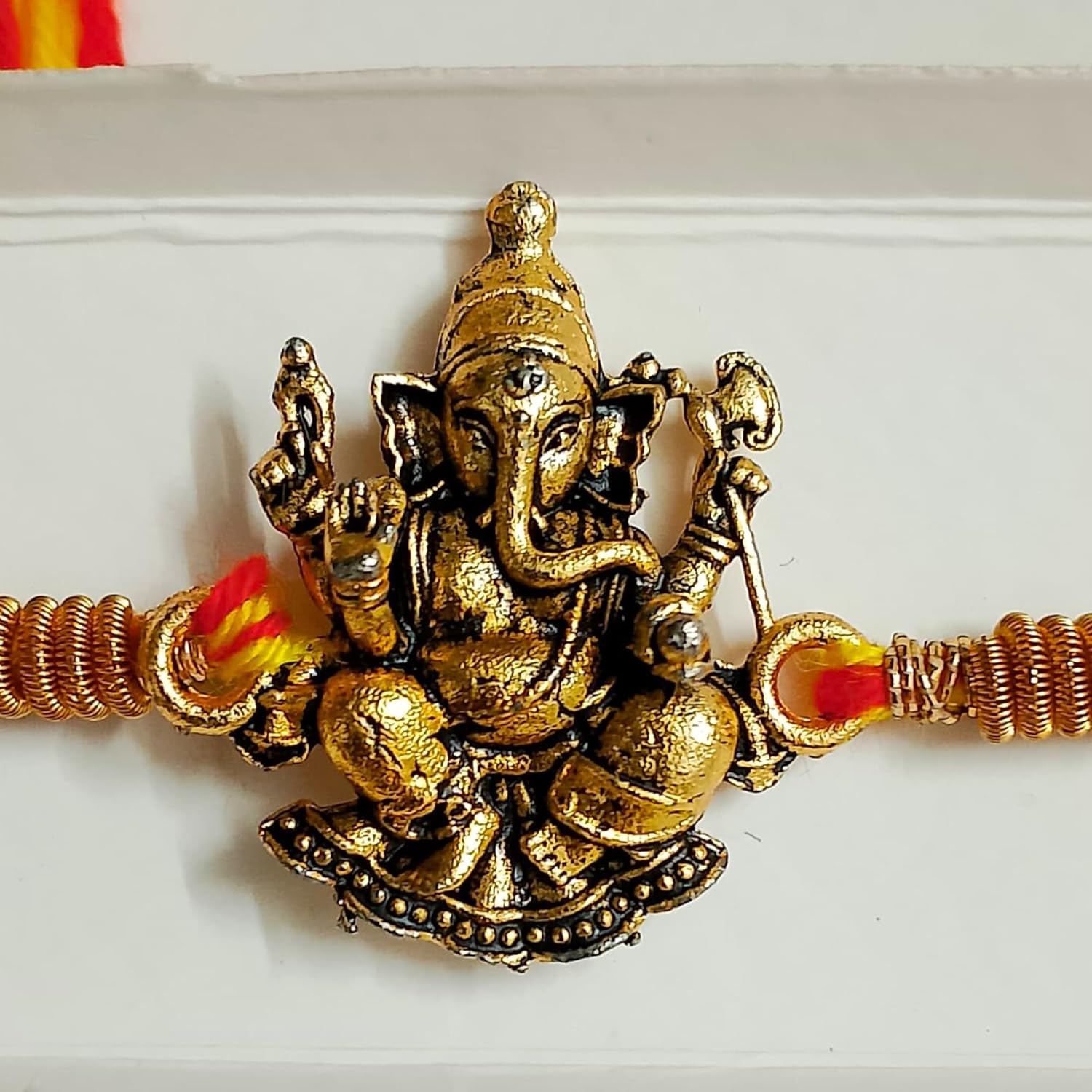 santarms Ganesh Ji Rakhi for Brother | Traditional Lord Ganesha Rakhi for Rakshabandhan with Decorative Box & Roli Chawal Combo