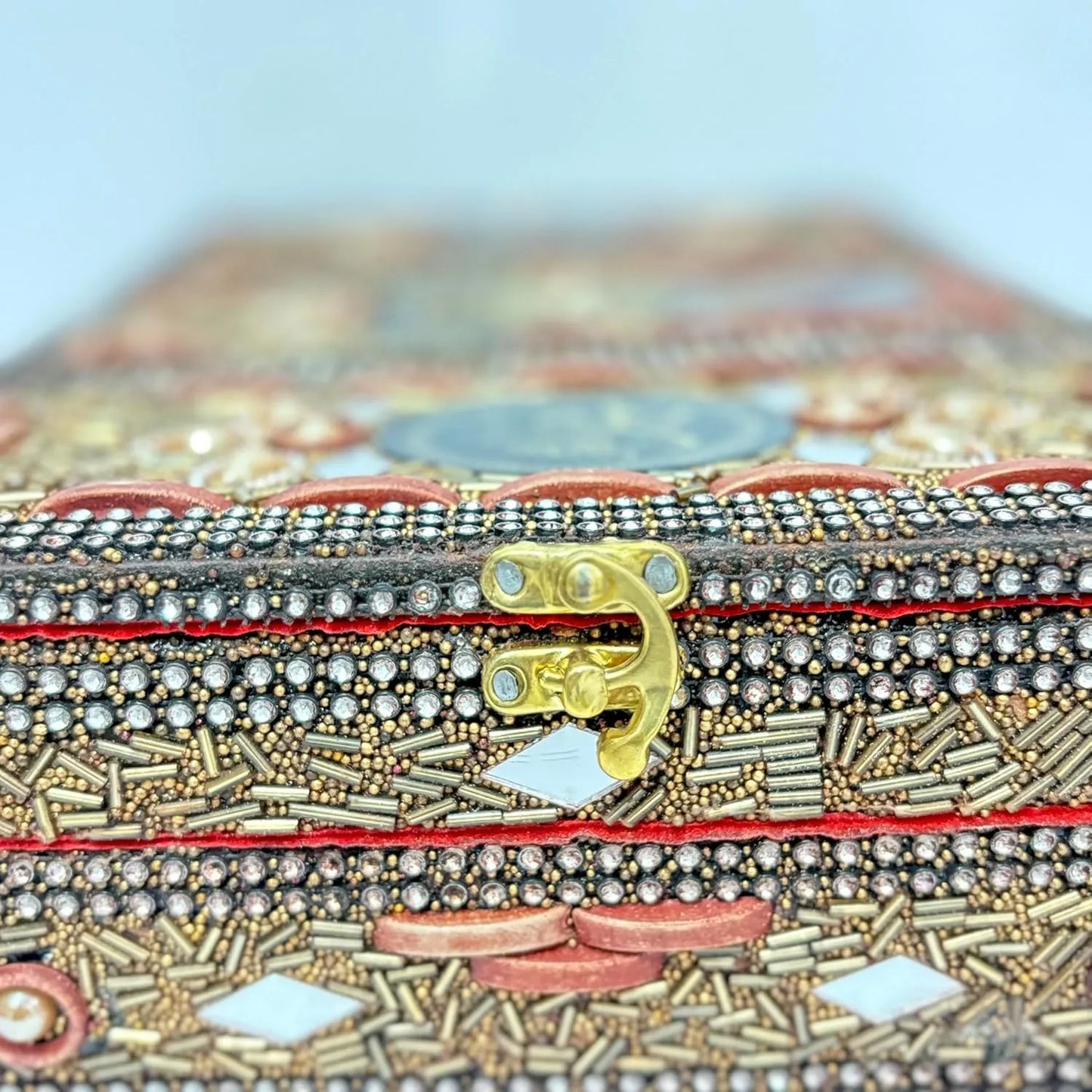 Brass lock and beadwork detail on wooden Quran Rehal box Santarms