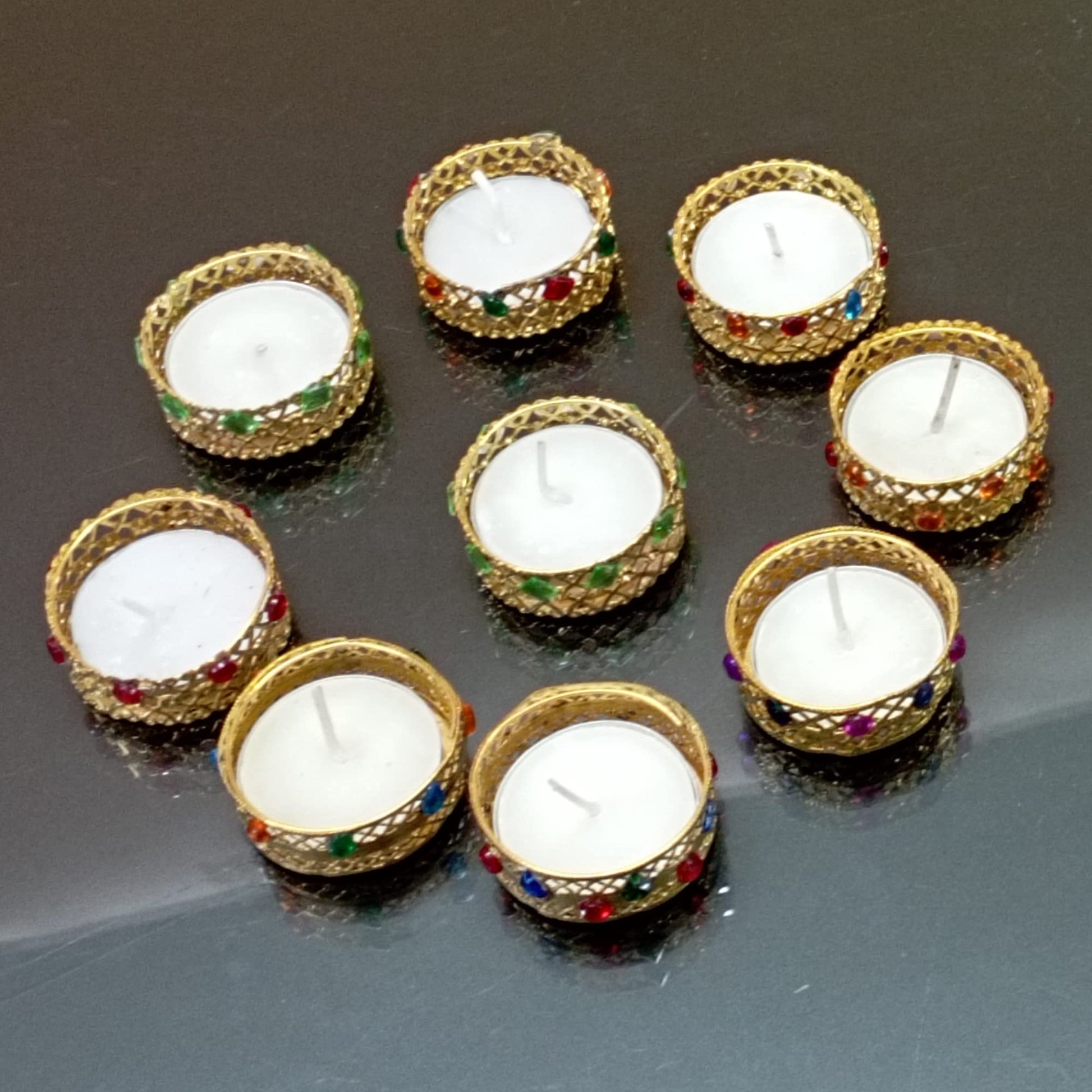 Handcrafted golden-red tealight candles for Diwali & festivals. Eco-friendly, smokeless & elegant. Perfect for gifting & home décor by Santarms.