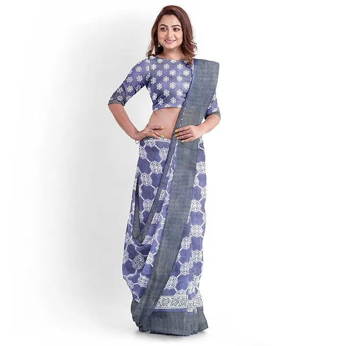 Woman wearing a blue and white patterned saree on a white background hira silk santarms