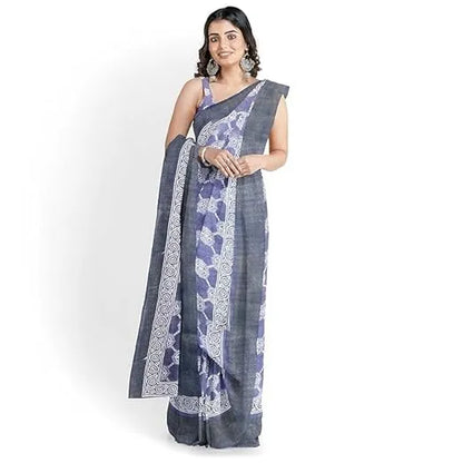 Woman wearing a blue and white saree with a white background hira silk santarms