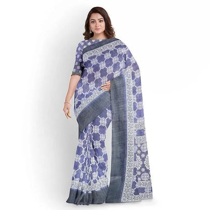 Woman wearing a blue and white patterned saree on a white background hira silk santarms