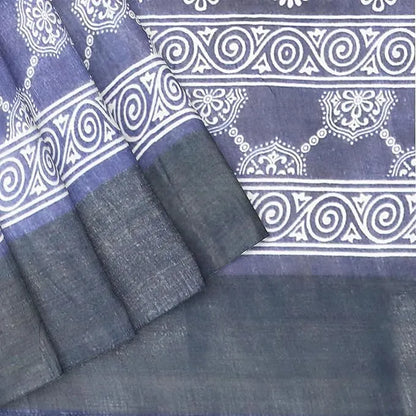 Blue and white patterned fabric with a folded section hira silk santarms