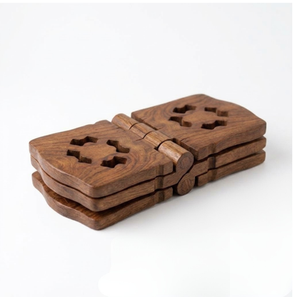 A stack of four wooden coasters with a carved cross-shaped cutout on top, displayed on a clean white background.
