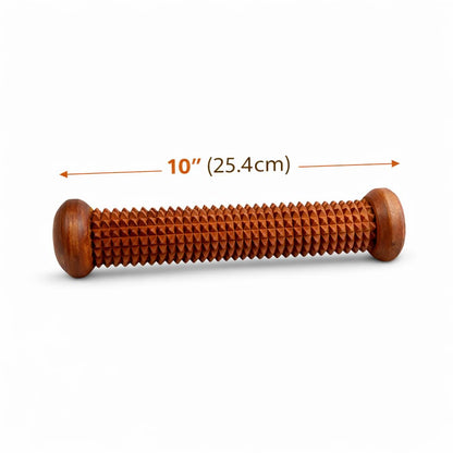 A wooden massage tool with a textured, ribbed shaft and rounded ends, shown on a white background with a dimension overlay indicating its length is 10 inches (25.4 cm).