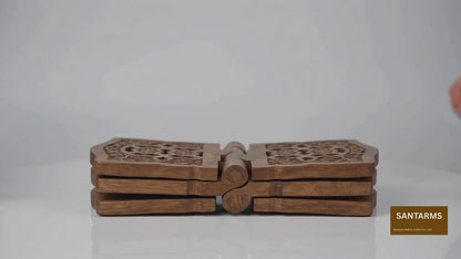 wooden prayer stand with decorative cutout patterns on the curved top, shown on a plain white background.