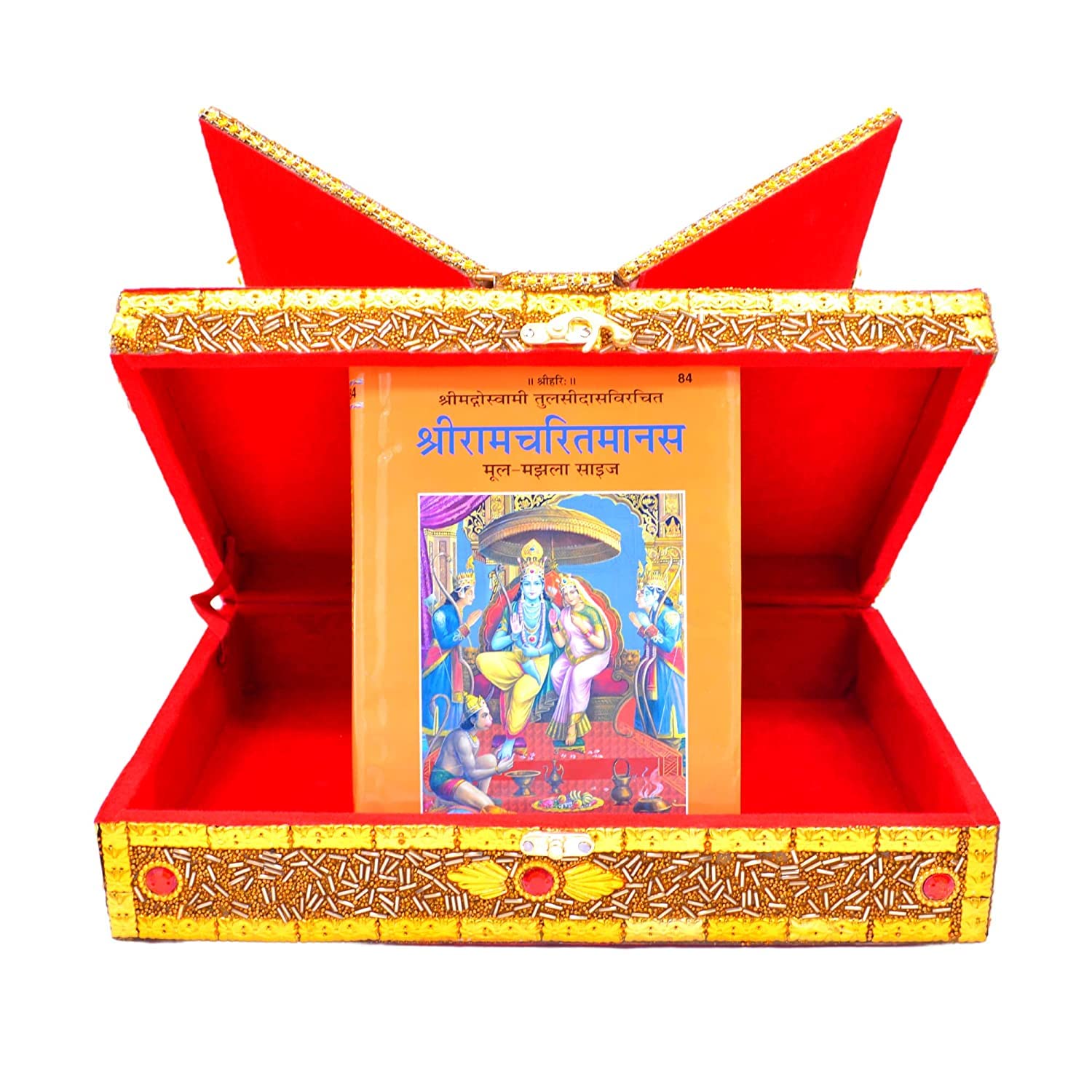 An open red and gold decorative box containing a book with Hindi text and a colorful illustration of Lord Shiva, set against a plain white background.