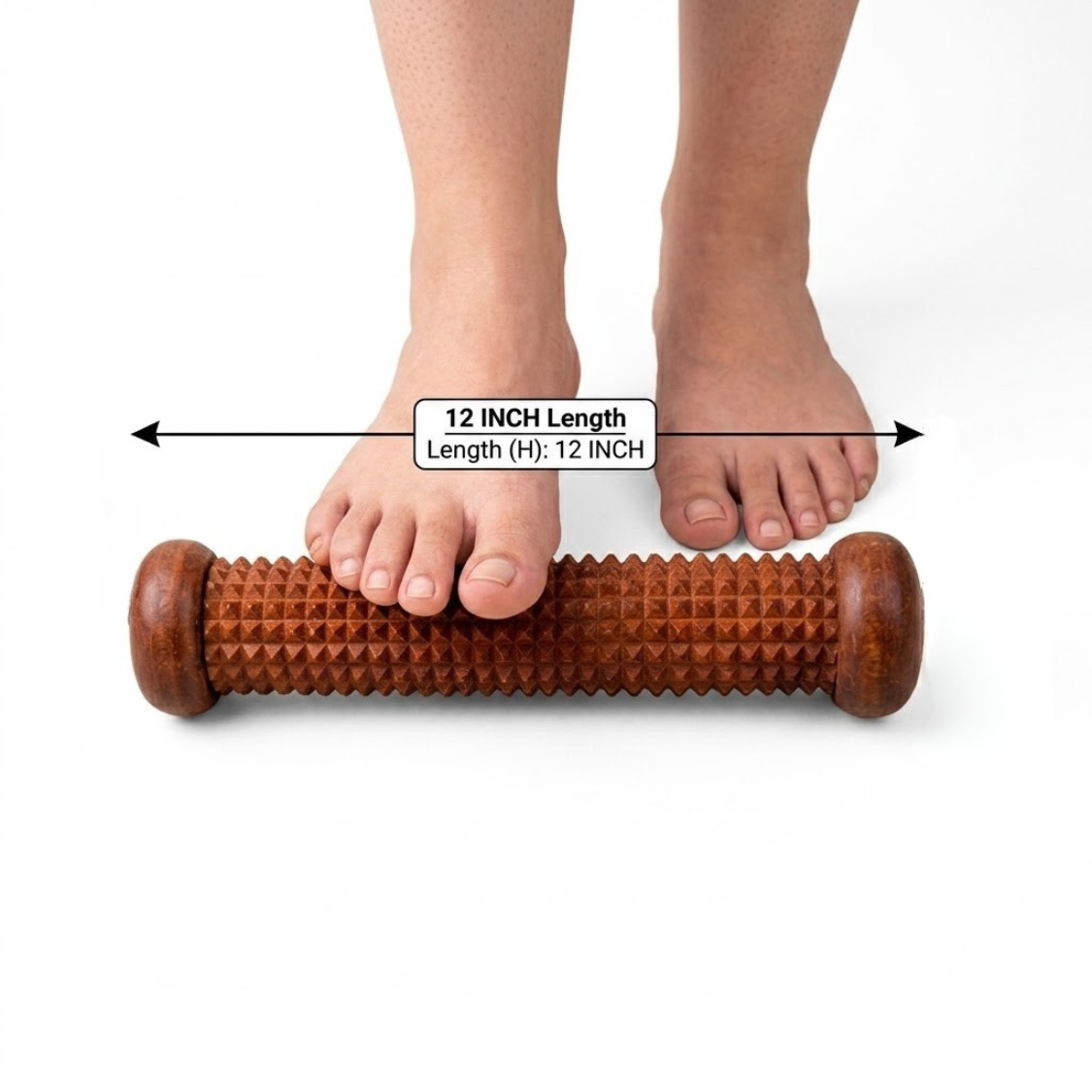 A wooden foot roller massage tool with a textured, diamond-patterned surface and rounded ends, shown under a person's feet with a measurement overlay indicating a 12-inch length.